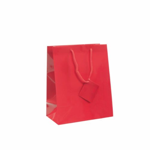 Sac luxe couleur rouge. Sac pelliculé brillant avec cordon pour poignée et une carte pour écrire quelques mots. Sac réutilisable